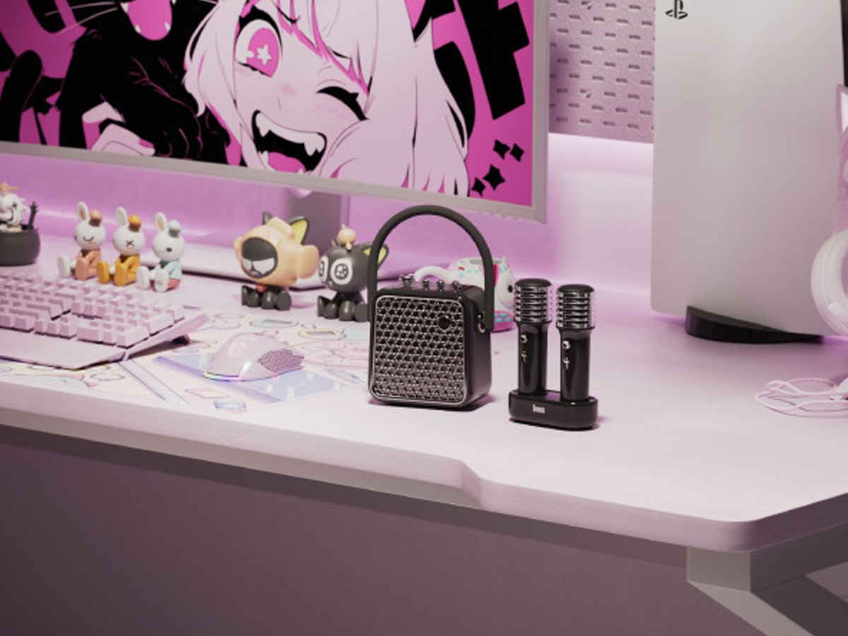 Bluetooth колонка Divoom Songbird-se с фиолетовыми караоке эффектами.